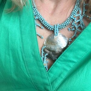 Ornate unique beaded necklace statement with shells in baby blue